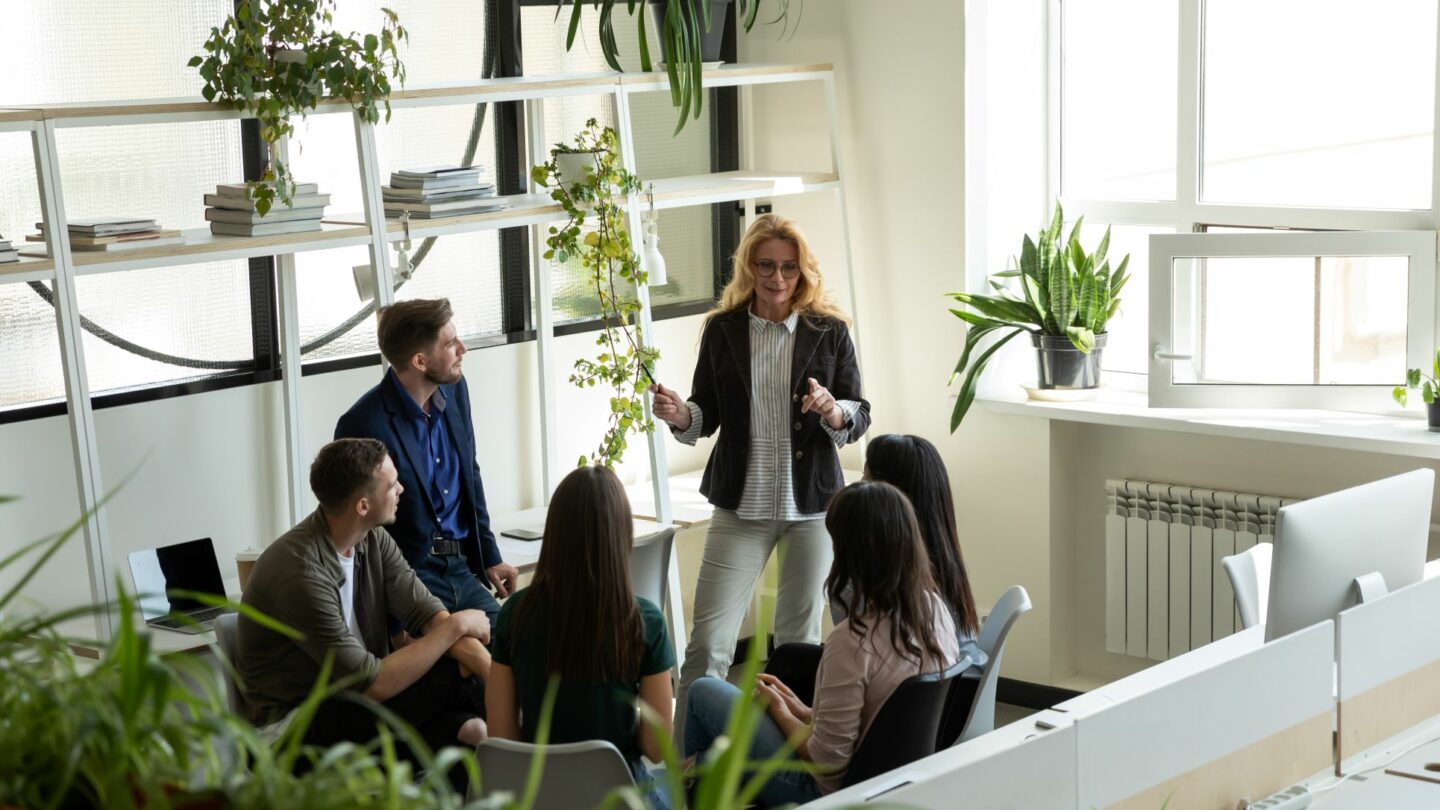 Female manager leading team meeting - menopause training