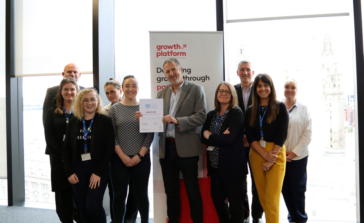 Growth Platform team with Workplace Wellbeing Charter accreditation
