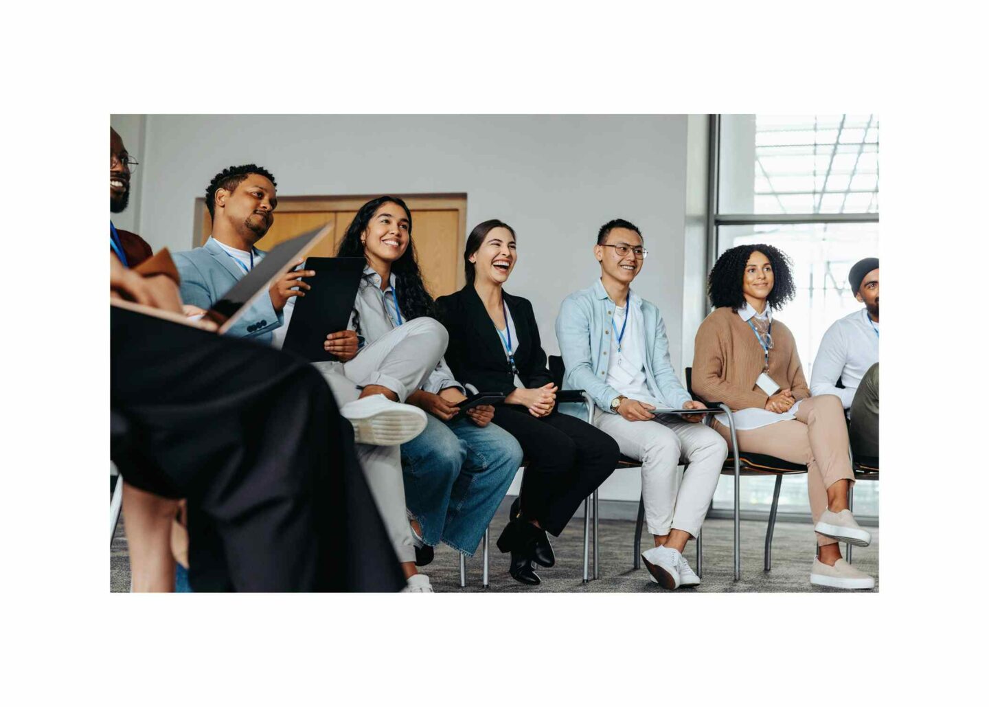 Business seminar with a diverse group of engaged employees.
